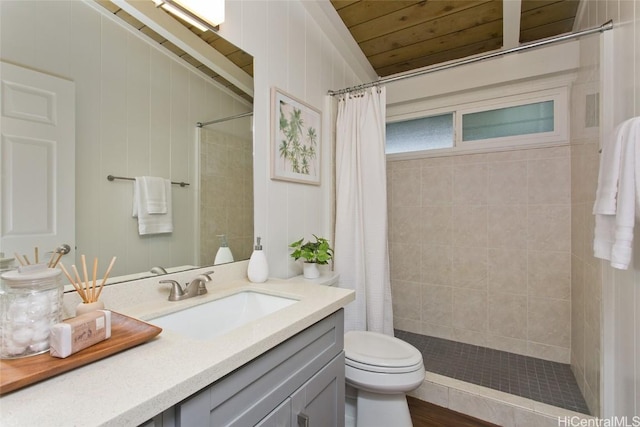 full bath with toilet, wooden ceiling, a tile shower, and vanity