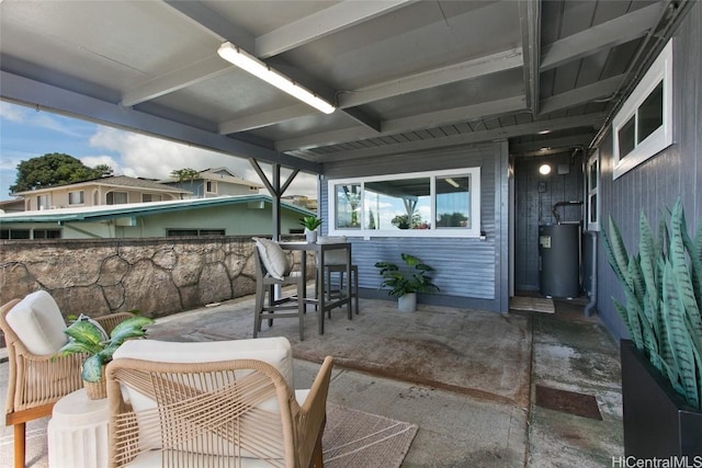 view of patio / terrace featuring water heater