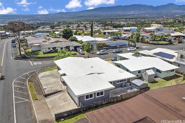 birds eye view of property with a residential view and a mountain view