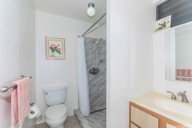 full bath featuring marble finish floor, toilet, tiled shower, and vanity