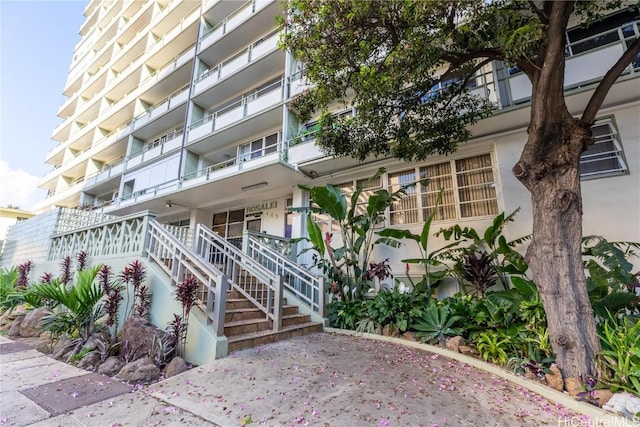 view of property with stairway