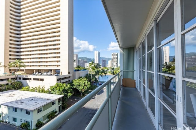 balcony featuring a view of city