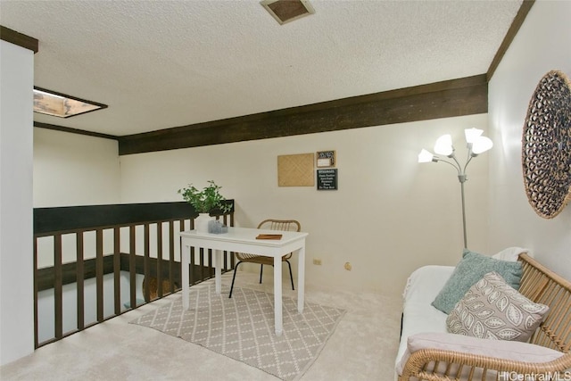 interior space with crown molding, a textured ceiling, visible vents, and carpet flooring