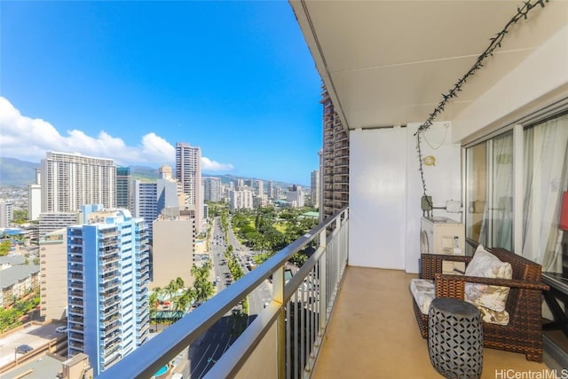 balcony featuring a city view