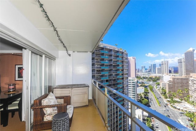 balcony featuring a view of city