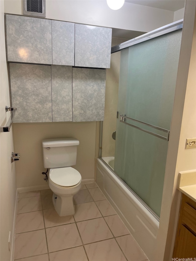 825 Coolidge St Unit 311, Honolulu, HI 96826 - bathroom with toilet, vanity, enclosed tub / shower combo, and baseboards