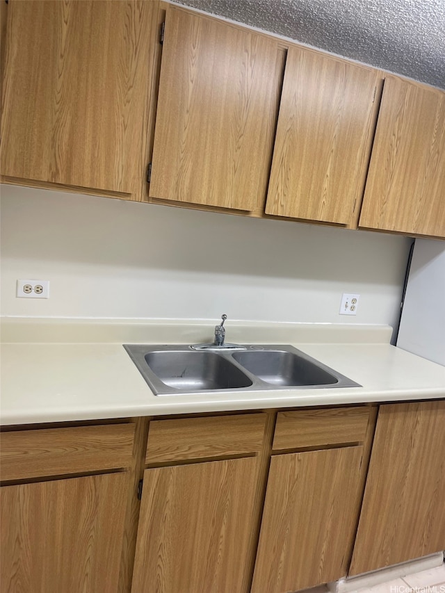 825 Coolidge St Unit 311, Honolulu, HI 96826 - kitchen featuring a sink and light countertops