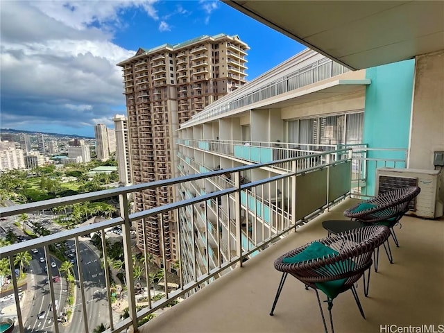 balcony featuring a city view