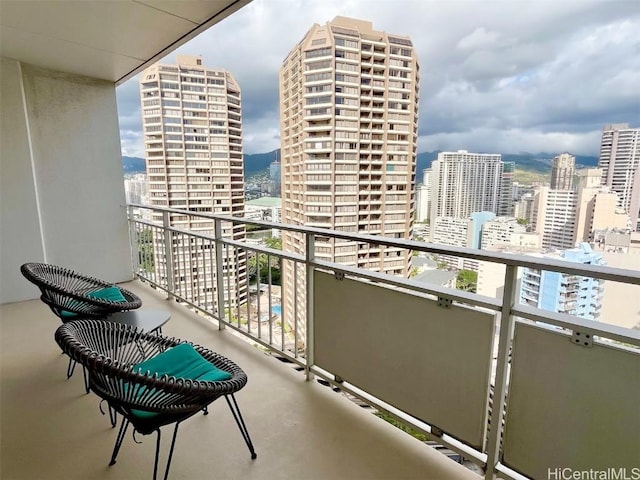 balcony featuring a city view