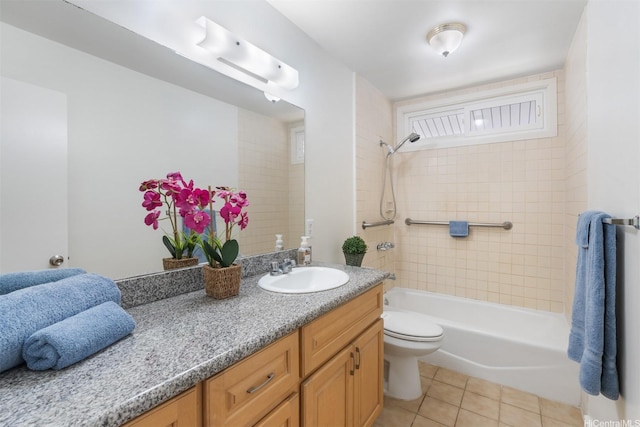 bathroom with vanity, toilet, washtub / shower combination, and tile patterned floors