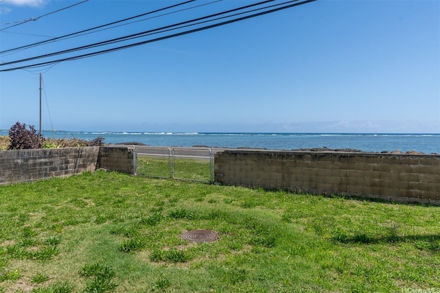 property view of water featuring fence private yard
