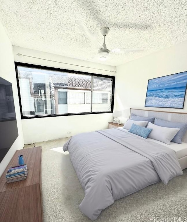 carpeted bedroom featuring a textured ceiling