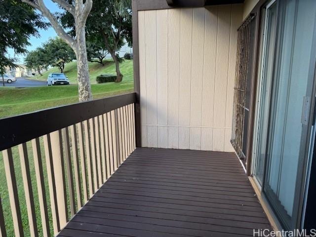 wooden deck with a yard