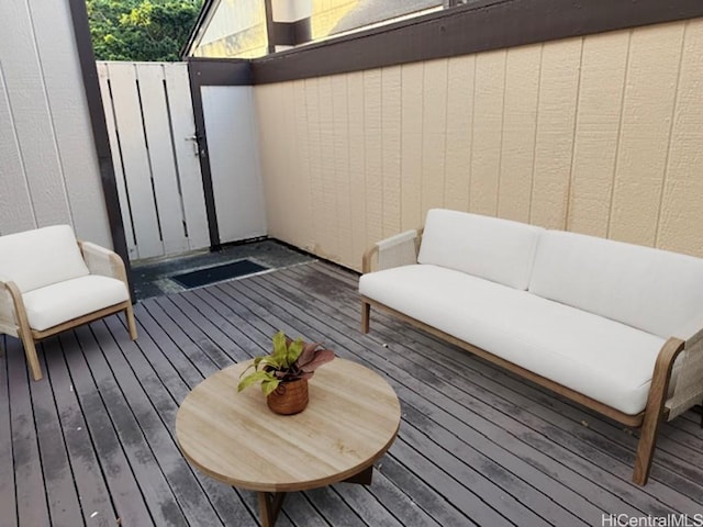 wooden deck with outdoor lounge area