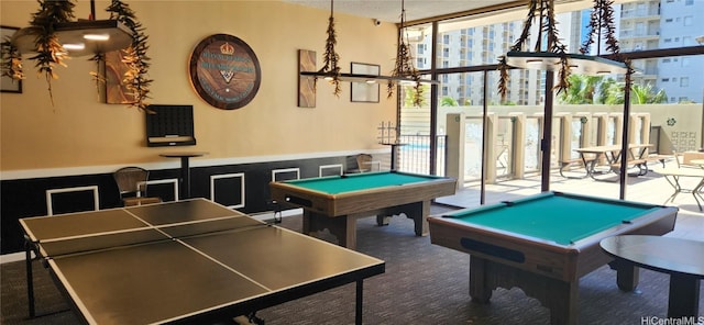 game room featuring expansive windows, wainscoting, and billiards