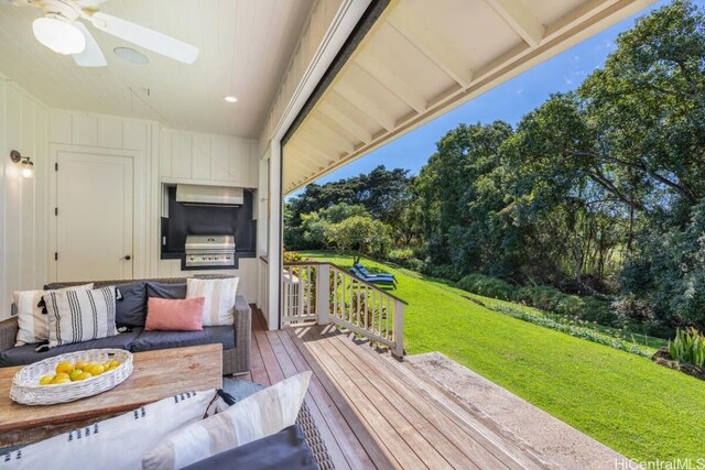 5395-B Loi Pl Unit 1, Koloa, HI 96756 - wooden deck with grilling area, an outdoor hangout area, and a lawn