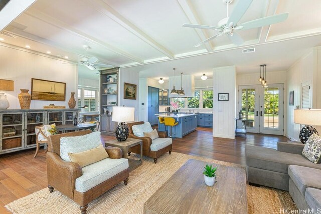 5395-B Loi Pl Unit 1, Koloa, HI 96756 - living area featuring visible vents, wood finished floors, beam ceiling, and a ceiling fan