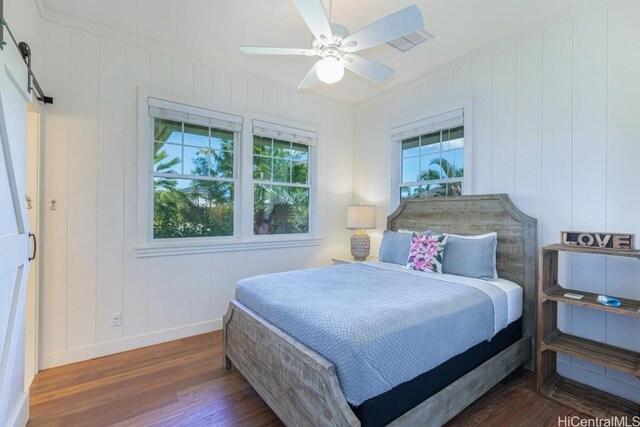 5395-B Loi Pl Unit 1, Koloa, HI 96756 - bedroom featuring baseboards, visible vents, wood finished floors, and a ceiling fan