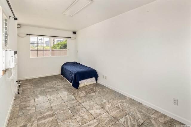 1840 Lusitana St Unit A, Honolulu, HI 96813 - unfurnished bedroom featuring baseboards