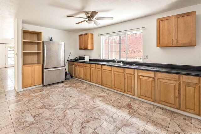 1840 Lusitana St Unit A, Honolulu, HI 96813 - kitchen featuring freestanding refrigerator, white microwave, a sink, and healthy amount of natural light