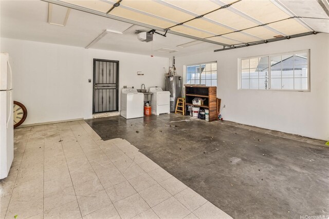 1840 Lusitana St Unit A, Honolulu, HI 96813 - garage featuring washer and clothes dryer, a garage door opener, electric water heater, and freestanding refrigerator