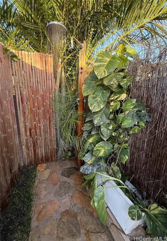 view of patio / terrace featuring fence