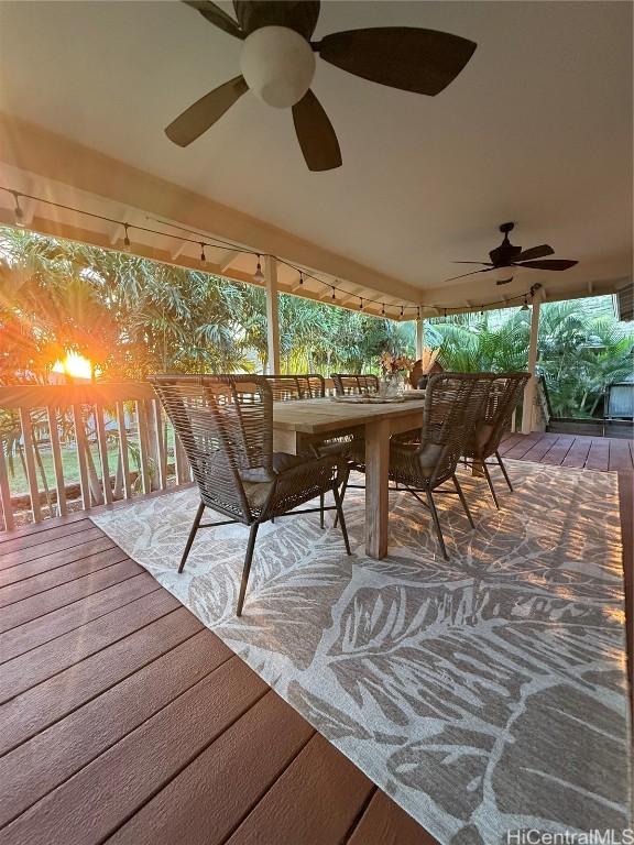 deck featuring ceiling fan and outdoor dining space