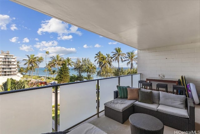 balcony featuring a water view