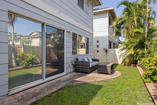 view of yard with an outdoor living space, a patio area, and fence