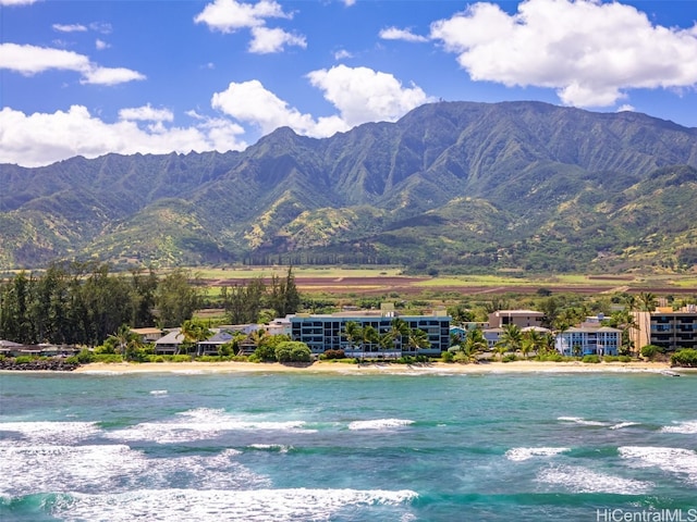 mountain view featuring a water view