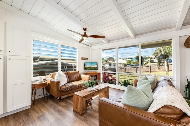 sunroom / solarium featuring wooden ceiling, vaulted ceiling with beams, and ceiling fan