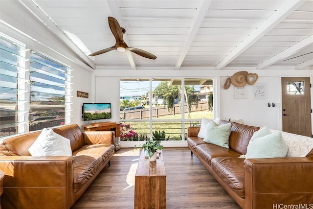 sunroom / solarium with wood ceiling, lofted ceiling with beams, and ceiling fan