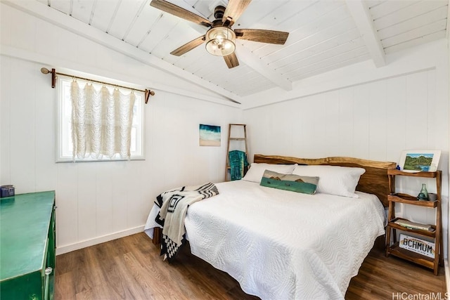 bedroom featuring a ceiling fan, lofted ceiling with beams, wood ceiling, and wood finished floors