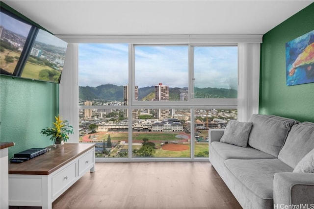 sunroom featuring a view of city