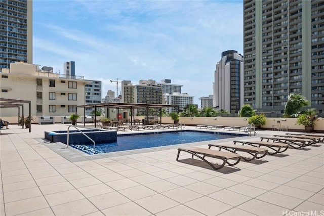 2211 Ala Wai Blvd Unit 2414, Honolulu, HI 96815 - pool featuring a city view and a patio