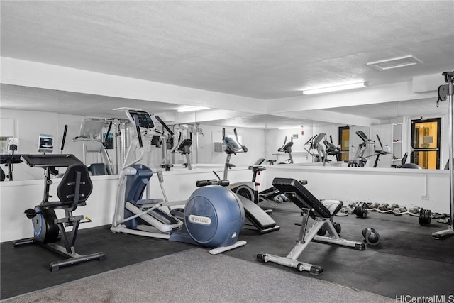 2211 Ala Wai Blvd Unit 2414, Honolulu, HI 96815 - exercise room featuring a textured ceiling