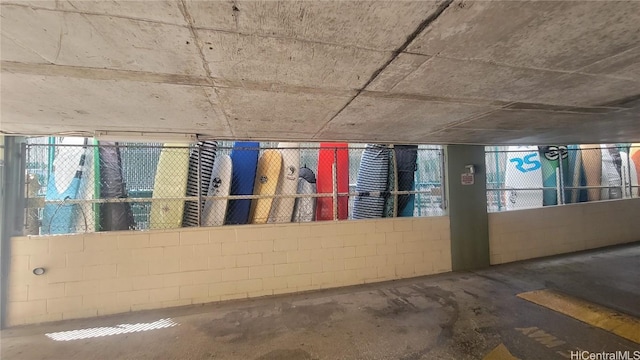 2211 Ala Wai Blvd Unit 2414, Honolulu, HI 96815 - miscellaneous room with concrete floors and concrete block wall
