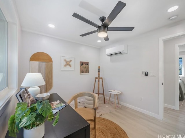 office area featuring a wall unit AC, baseboards, light wood finished floors, recessed lighting, and ceiling fan