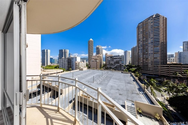 balcony featuring a city view