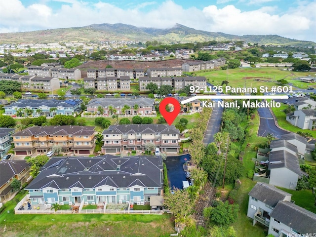 bird's eye view featuring a mountain view and a residential view