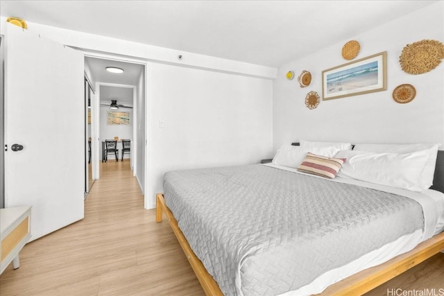 bedroom featuring light wood-style floors