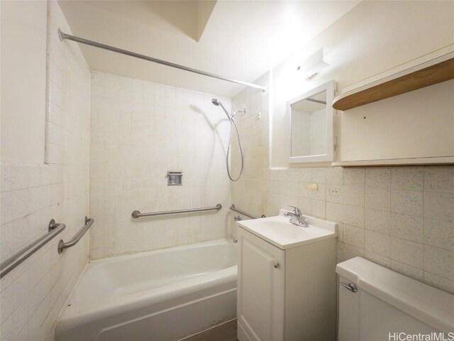 922 Kapahulu Ave Unit 207, Honolulu, HI 96816 - bathroom with  shower combination, tile walls, toilet, and vanity