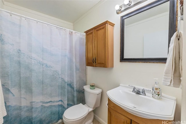 bathroom with toilet, vanity, a shower with curtain, and ornamental molding