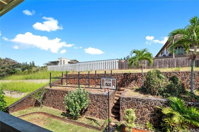 view of yard with fence