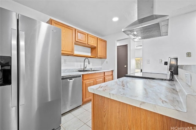 kitchen featuring light tile patterned floors, a sink, light countertops, appliances with stainless steel finishes, and range hood