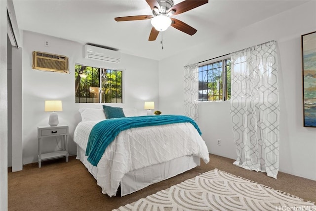 carpeted bedroom with ceiling fan, multiple windows, a wall mounted air conditioner, and a wall mounted AC