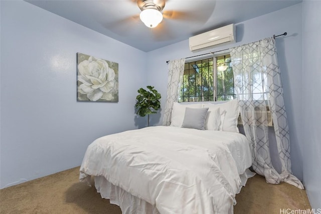 carpeted bedroom featuring a ceiling fan and a wall mounted AC