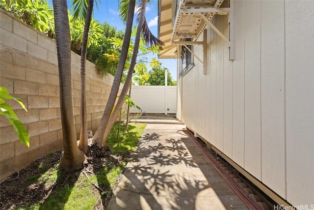 view of property exterior featuring fence