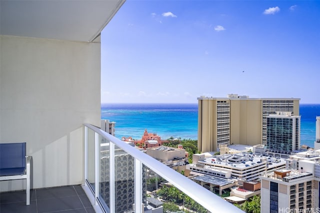 balcony featuring a water view