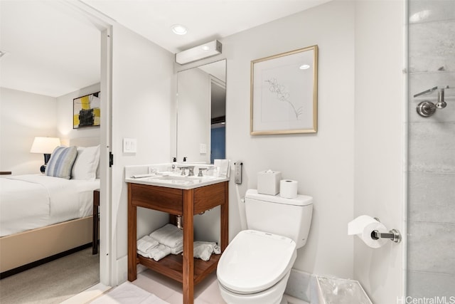 ensuite bathroom with visible vents, toilet, recessed lighting, ensuite bathroom, and vanity